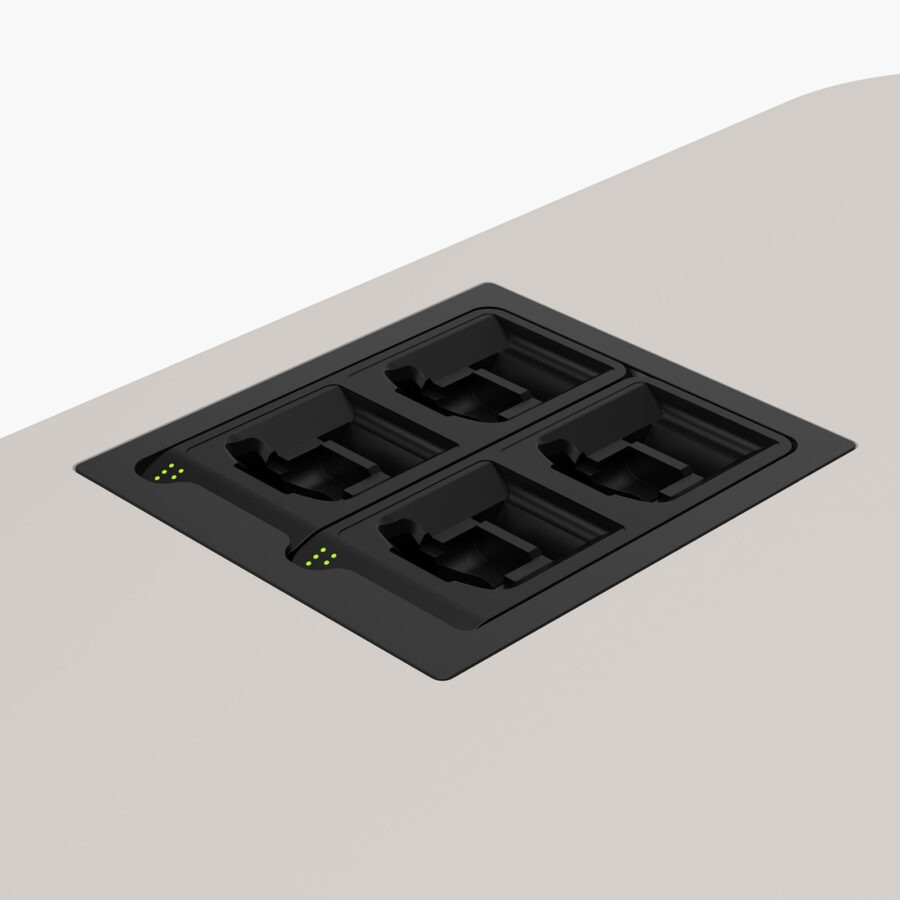 Battery charger holder for wireless microphones &transmitters installed into lectern worktop