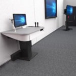 Teachers touchdown point against the wall in a university learning space