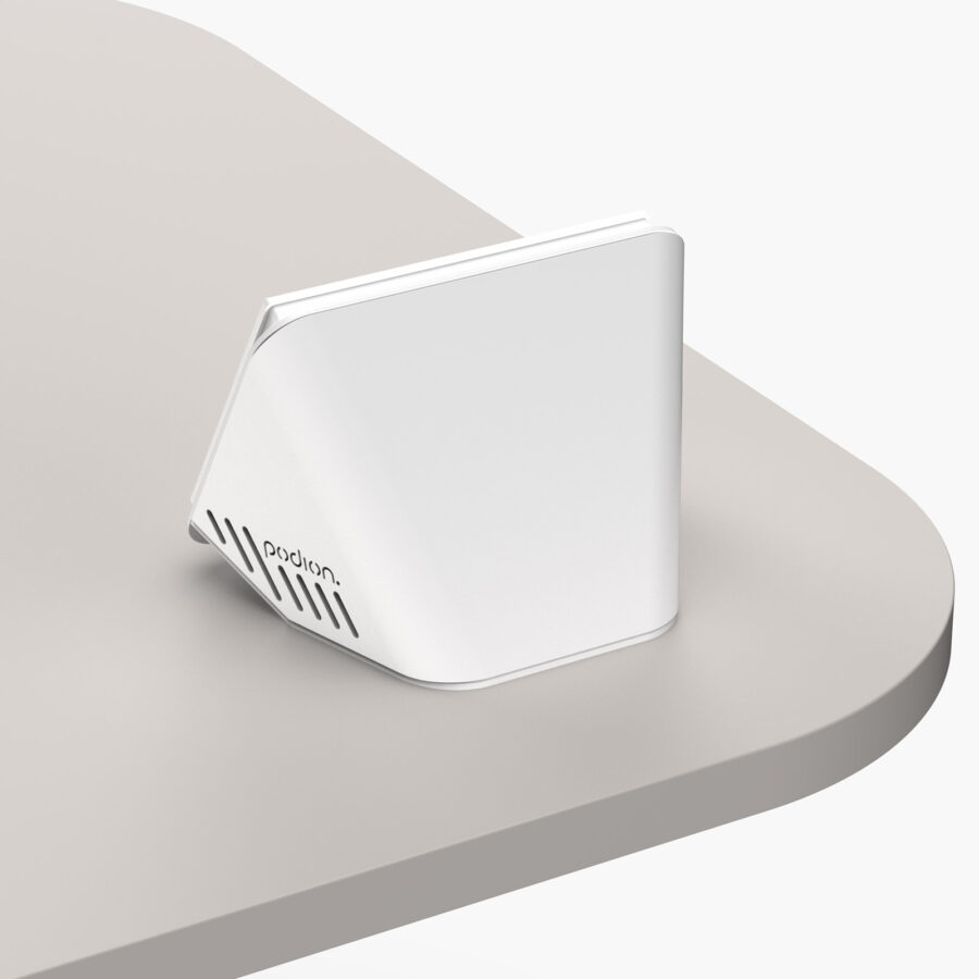 White desk-mounted housing for AMX Massio 8-Button Control Pad installed onto multimedia lectern worktop