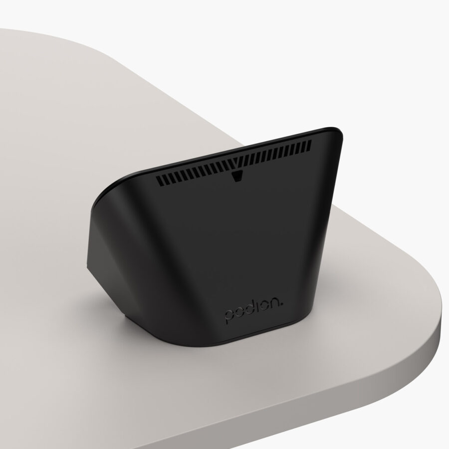 Desk-mount housing for Creston TSW-1060 Control Pad installed on lectern worktop