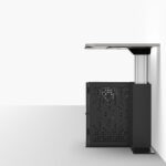 Height adjustable multimedia teachers desk shown positioned up against a wall