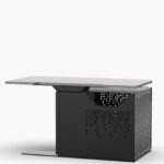 Mutlimedia teachers desk showing the side that sits against a wall, with cable management and ventilated av cabinet