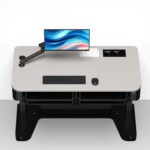 Wall positioned lectern featuring integrated monitor arm, recessed power modules, keyboard workspace and concealed AV racks.